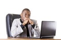 Stressed businessman working on laptop Royalty Free Stock Photo