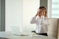 Stressed businesswoman feeling despair suffering from overwork