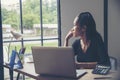 Stressed businesswoman Frustrated and upset in businessn working on laptop, Royalty Free Stock Photo