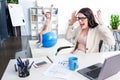 Stressed businesswoman yelling in office Royalty Free Stock Photo