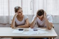 Stressed caucacian couple conclict of credit card bills or bebt of over expense in shopping. Lover financial risk or crisis and Royalty Free Stock Photo