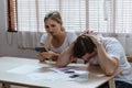 Stressed caucacian couple conclict of credit card bills or bebt of over expense in shopping. Lover financial risk or crisis and Royalty Free Stock Photo