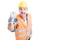 Stressed constructor yelling and standing with fist up