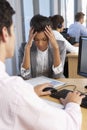 Stressed Employee Working In Busy Office Royalty Free Stock Photo