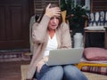 Stressed forgetful middle aged woman at home Royalty Free Stock Photo
