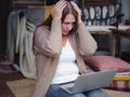 Stressed forgetful middle aged woman at home Royalty Free Stock Photo