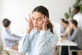 Stressed frustrated young woman employee feeling dizzy or having Royalty Free Stock Photo