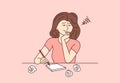 Stressed girl, sits at a table with crumpled papers and writes a story for a book. Depressed female writer without inspiration Royalty Free Stock Photo