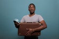 Stressed guy carrying suitcase and running late for vacation trip Royalty Free Stock Photo