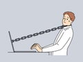 Stressed male employee tied with chain to computer