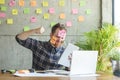 Stressed man with message on sticky notes Royalty Free Stock Photo