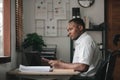 Stressed man professional sitting at office workplace, Tired and overworked businessman, Young exhausted student men in Royalty Free Stock Photo