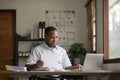 Stressed man professional sitting at office workplace, Tired and overworked businessman, Young exhausted student men in Royalty Free Stock Photo