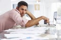 Stressed Man Working At Laptop In Home Office Royalty Free Stock Photo