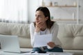 Stressed millennial woman thinking of financial problems. Royalty Free Stock Photo