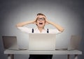 Stressed nervous businesswoman in her office Royalty Free Stock Photo