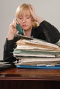 Stressed office executive on phone Royalty Free Stock Photo