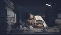 Stressed office worker sleeping at his desk Royalty Free Stock Photo
