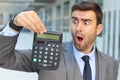 Stressed out businessman smoking four cigarettes at the same time Royalty Free Stock Photo