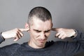 Stressed out young man to refuse to listen to problems