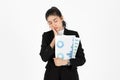 Stressed overworked and confused young Asian business woman in suit troubled with financial problem over white isolated background Royalty Free Stock Photo