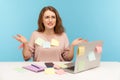 Stressed overworked woman in nerd glasses sitting covered with sticky notes, looking outraged by workload Royalty Free Stock Photo