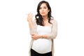 Sad pregnant woman holding a cigarette and smoking Royalty Free Stock Photo