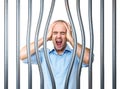 Stressed prisoner and bended metal Royalty Free Stock Photo