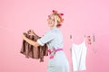 Stressed retro housewife. Maid or housewife cares about house. Vintage housekeeper woman. Busy mother. Multitasking mom Royalty Free Stock Photo