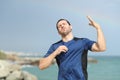 Stressed runner suffering heat stroke on the beach