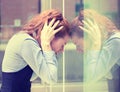 Stressed sad young woman outdoors. Urban life style stress Royalty Free Stock Photo