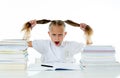 Stressed school girl feeling frustrated and unable to concentrate in her studies Royalty Free Stock Photo