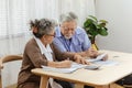 Stressed senior elderly couple conclict of credit card bills or bebt of expense in shopping. Lover financial risk or crisis and Royalty Free Stock Photo