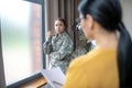 Stresse young servicewoman talking to her psychologist