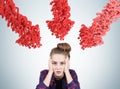 Stressed teen and arrows of question marks Royalty Free Stock Photo