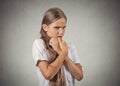 Stressed teenager girl looking anxiously afraid Royalty Free Stock Photo