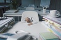 Tiny businessman sleeping at his desk