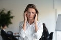 Stressed tired professional business woman feeling headache at work Royalty Free Stock Photo