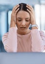 Stressed, tired and sick young woman with a headache feeling sad and overworked in an office. A frustrated, ill and Royalty Free Stock Photo