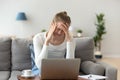 Stressed tired young woman feeling headache after long laptop work Royalty Free Stock Photo