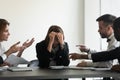 Stressed upset business woman suffer from bullying harassment at workplace