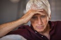 Stressed and upset senior man at home Royalty Free Stock Photo