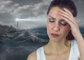 Stressed upset woman next to hopeful lighthouse