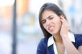 Stressed woman complaining suffering earache Royalty Free Stock Photo