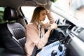 Stressed woman driver sitting inside her car on the road Royalty Free Stock Photo