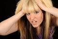 Stressed woman holding head Royalty Free Stock Photo