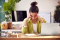 Stressed Woman Running Online Business Making Boutique Candles At Home Working On Laptop Royalty Free Stock Photo