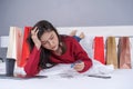 stressed woman using tablet and having problem for online shopping in bedroom Royalty Free Stock Photo