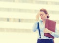 Stressed worried unhappy young woman corporate employee