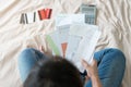 Stressed young asian woman trying to find money to pay credit card debt Royalty Free Stock Photo